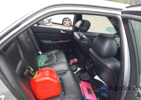 2002 Acura 3.5Rl 3.5 из США, поврежденный, VIN JH4KA96562C012571